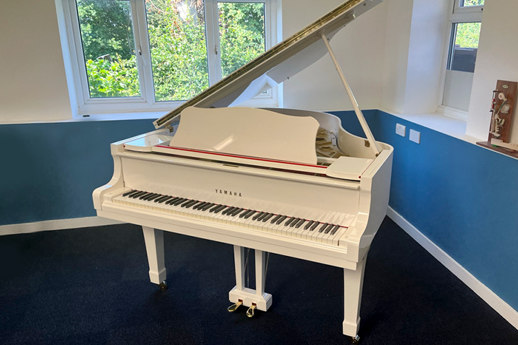 Yamaha G2 White Grand Piano in Showroom